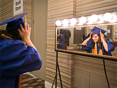 Grad Looking in the Mirror