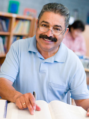 Man With Book Smiling Image