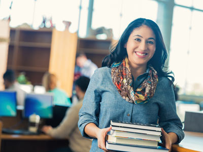 Woman Student With Books Image