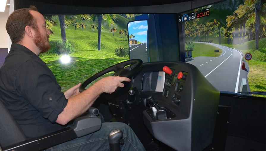 Student in driving simulator.