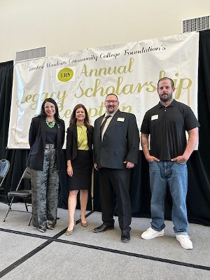 TMCC President Dr. Karin Hilgersom, Foundation and Grants Executive Director Gretchen Sawyer, Jarret Orcutt, and Augustine 'Joey' Kennedy, a welding student advocating for his fellow justice-involved peers.