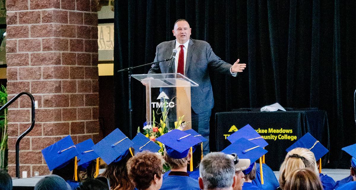 Western Nevada Community College President Vincent R. Solism speaking at the TMCC HSE graduation.