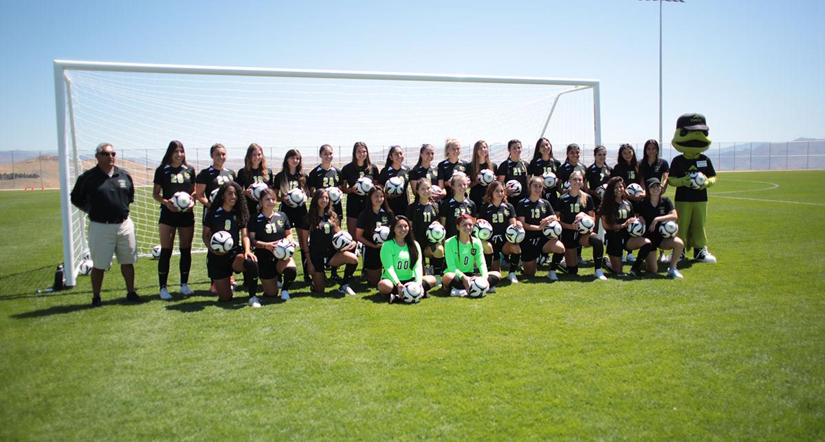 The TMCC Women’s Soccer team with Wizard. 