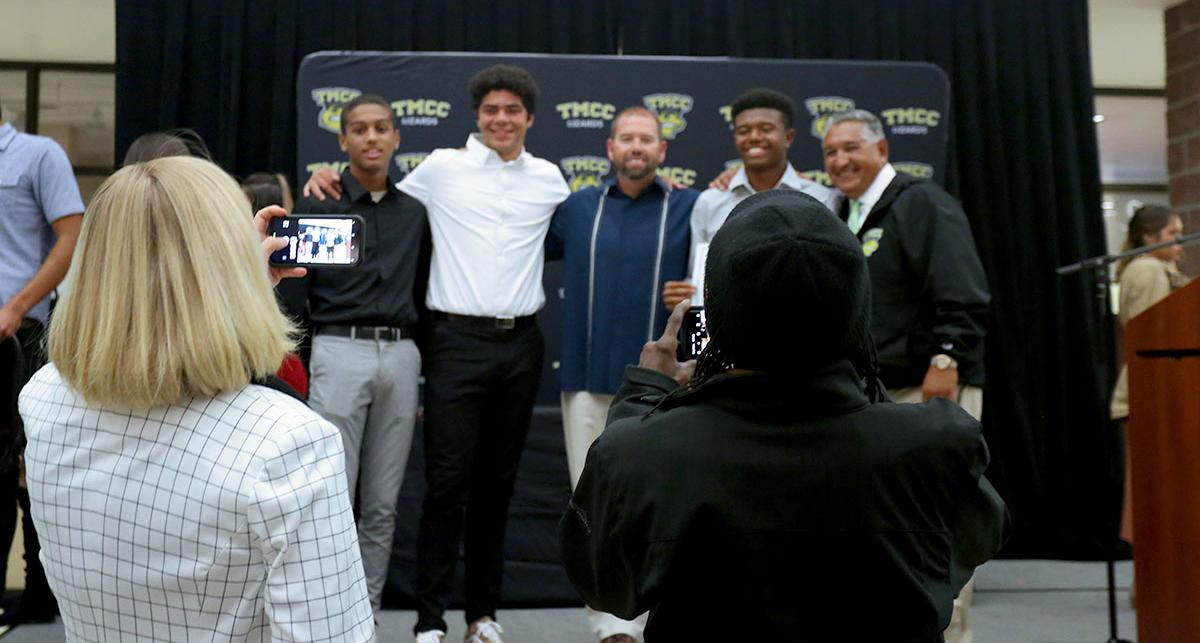 Student-athletes and coaches at the award banquet.