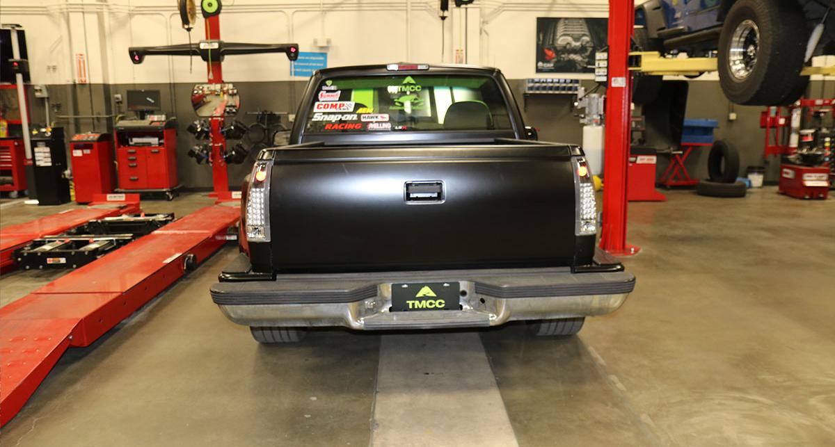 Photo of the rear view of the TMCC truck in the automotive workshop.