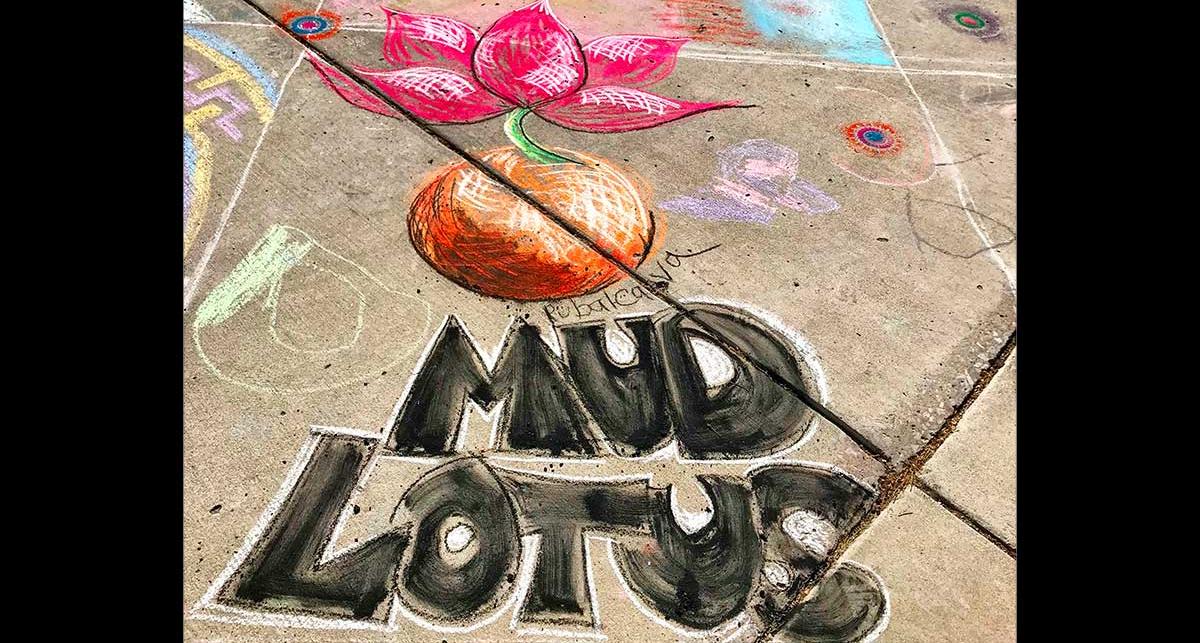 Chalk drawing of a flower and the words MUD LOTUS.