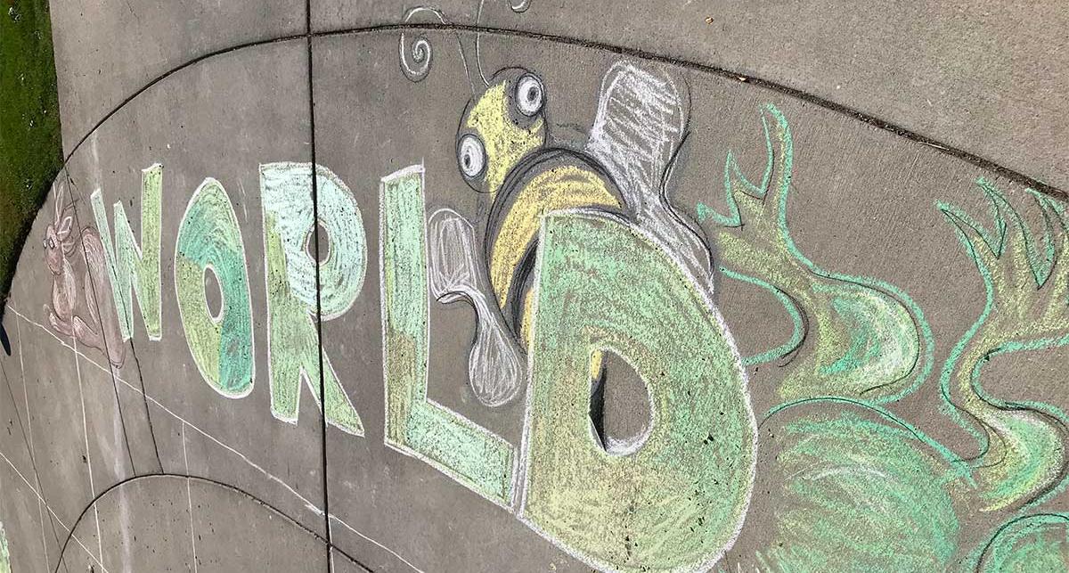 Chalk drawing of the word WORLD.