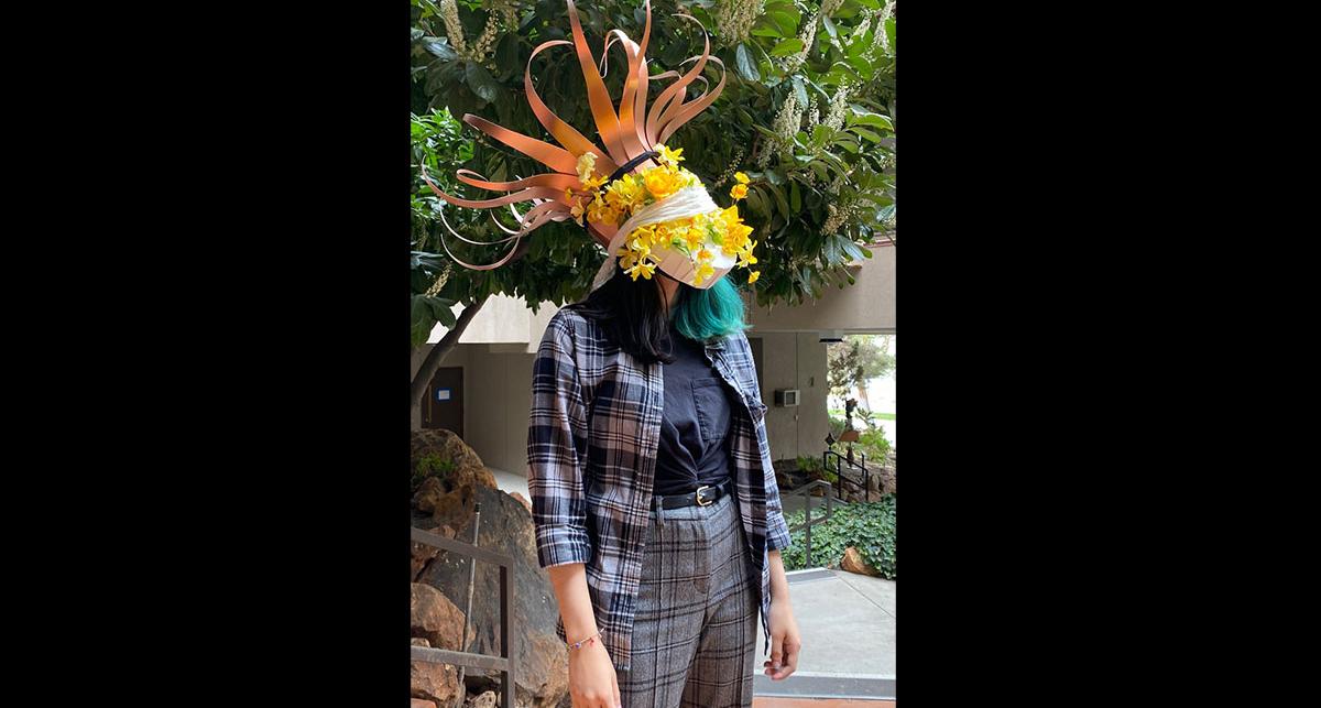 van lopez wearing his mask which is on display in the masks a la fini exhibition