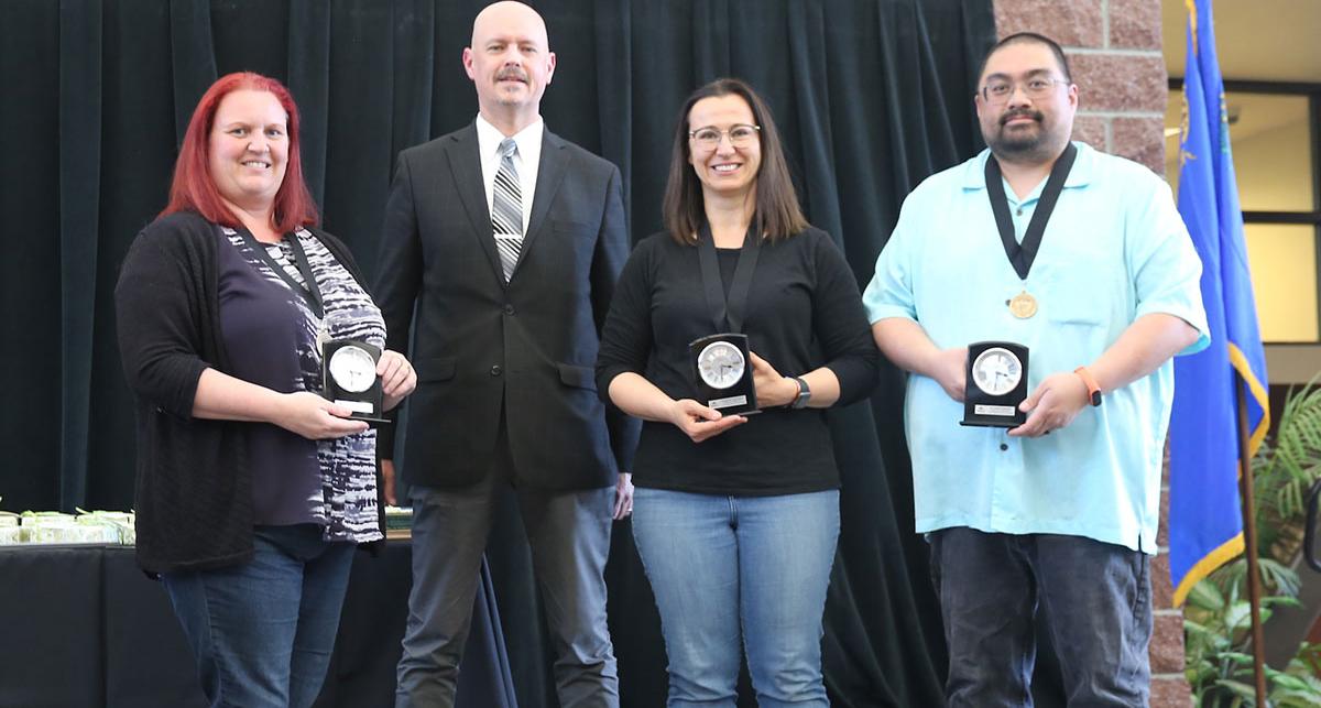 Dr. Jeffrey Alexander recognizes recently tenured faculty members.