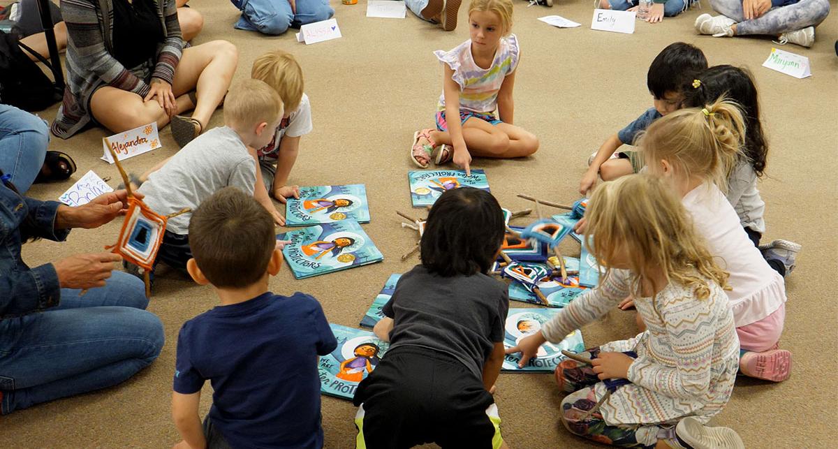 TMCC Child Care Center preschoolers with education students conducting the Water Protectors Sustainability Activity.