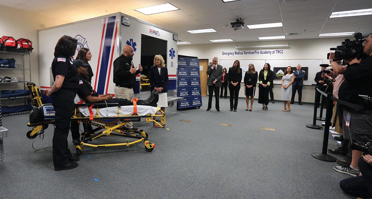 EMS/Paramedic students speak to Biden and Sisolak in front of an audience.