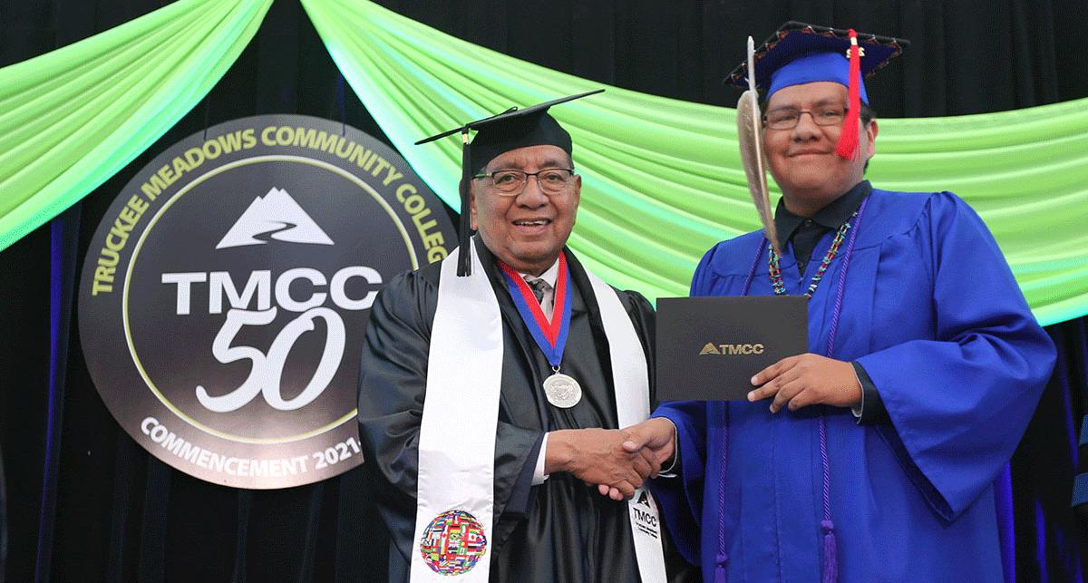 President's Medal Recipient Chairman Arlan Melendez poses with a graduate from the Reno-Sparks Indian Colony.