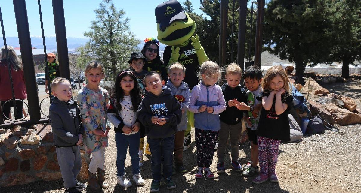 Children from the E.L. Cord Foundation Child Care Center got to have their picture taken with Wizard and release ladybugs.