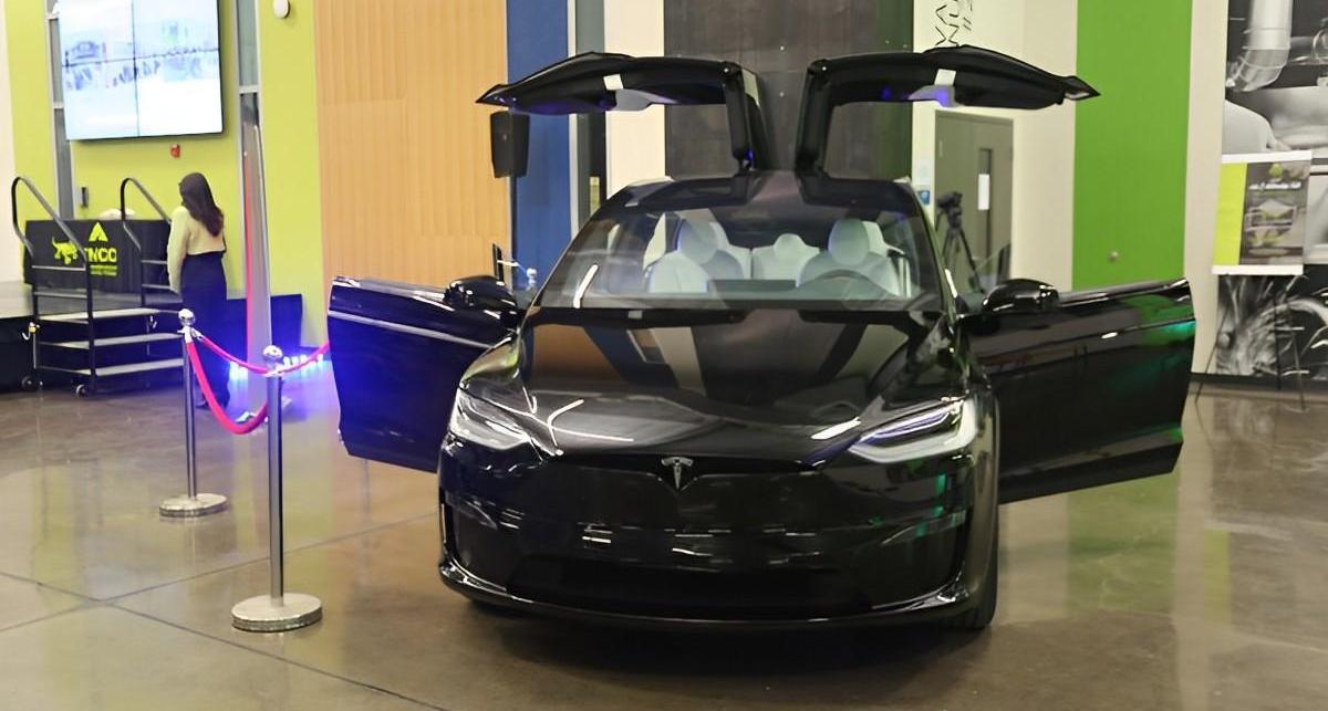 Black Tesla car that was available to examine during the celebration.