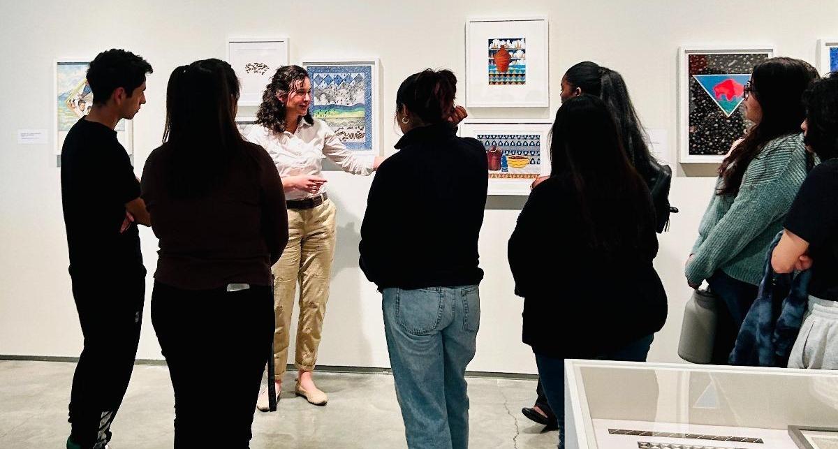 TRIO students resonating with works of local Indigenous artist Ben Aleck.