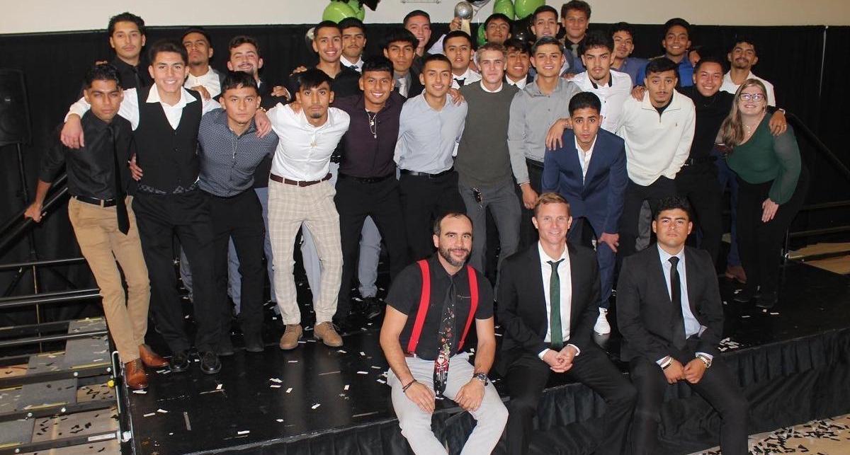 The Men's Soccer team gathers for a group photo.