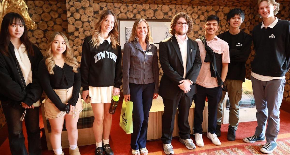 Hospitality students and their professor, Vanina Coudriet, touring the warm and refined Ritz-Carlton hotel.