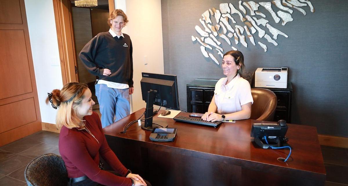 Hospitality students play the role of the concierge in a luxury customer experience.