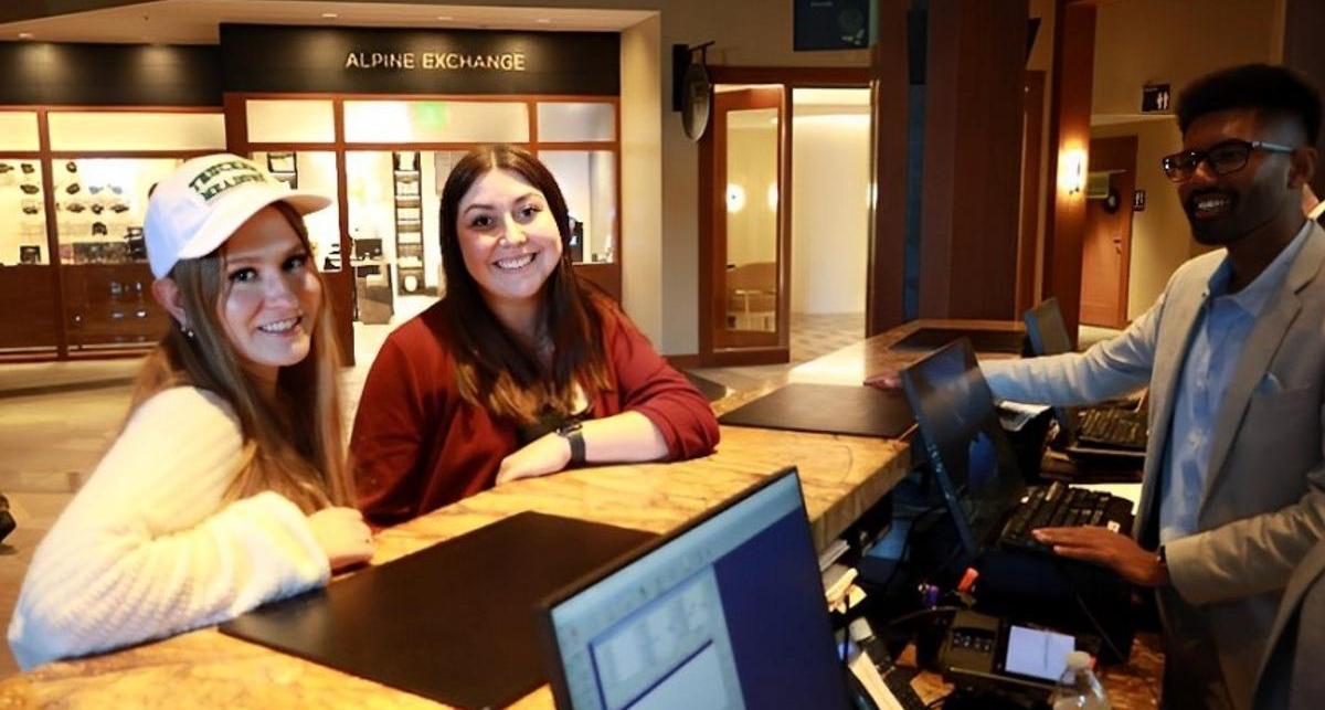 Hospitality students role-playing the check-in process with experienced hotel employees at the Ritz-Carlton, Lake Tahoe.