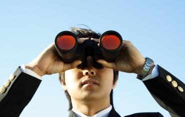 Man holding binoculars