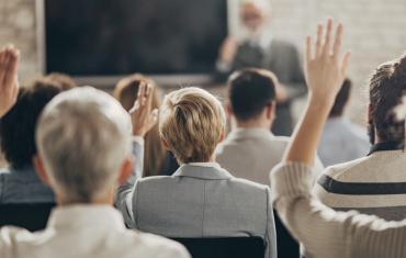 Student Raising Hands