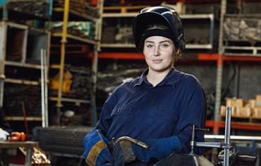 Person wearing gear in workshop