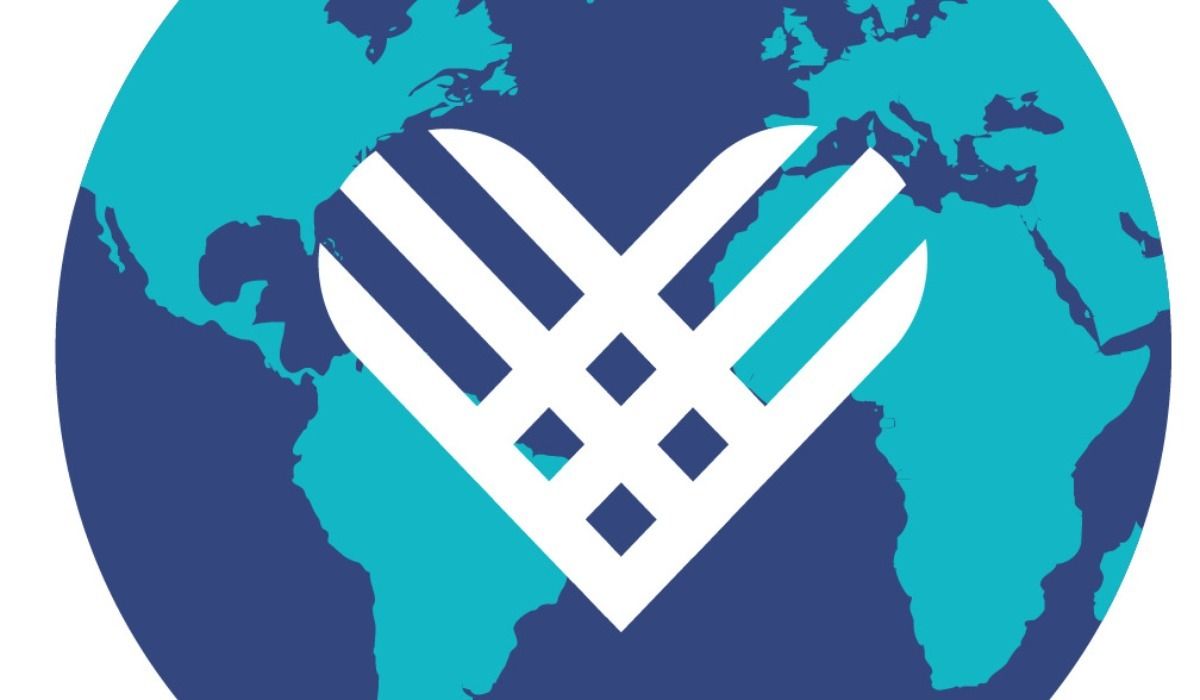 A Giving Tuesday logo depicts a dark blue earth with aquamarine continents and, in the middle, a white heart with stripes running through it.